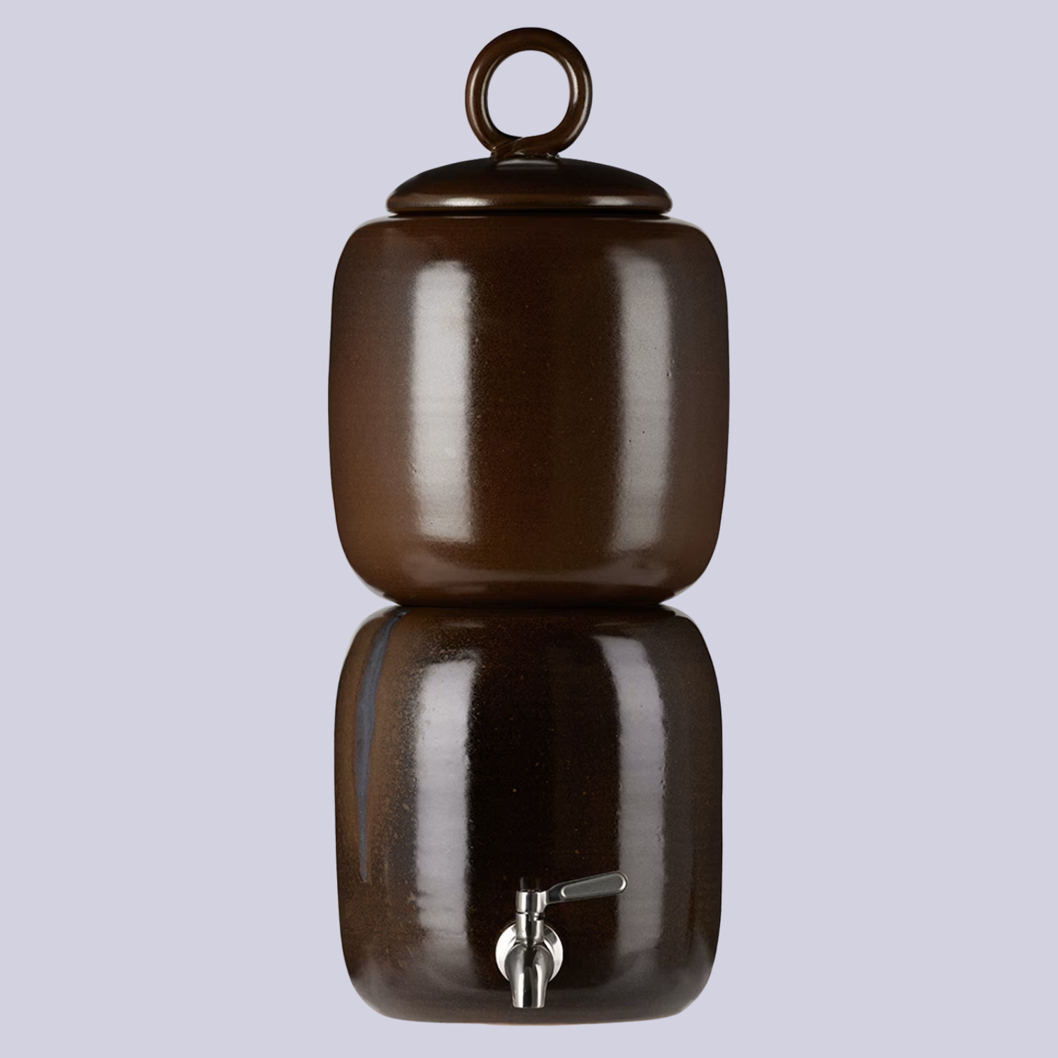 A dark brown glazed ceramic water dispenser against a lilac backdrop
