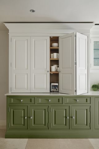 Tall kitchen cabinets with white upper cabinets and olive green bases