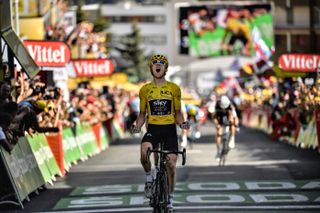Geraint Thomas winning stage 12 of the 2018 Tour de France in the yellow jersey on Alpe d'Huez