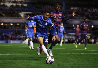 George Hall of Birmingham City is challenged by Taylor Richards of Queens Park Rangers during the Sky Bet Championship between Birmingham City and Queens Park Rangers at St Andrews (stadium) on October 28, 2022 in Birmingham, England.