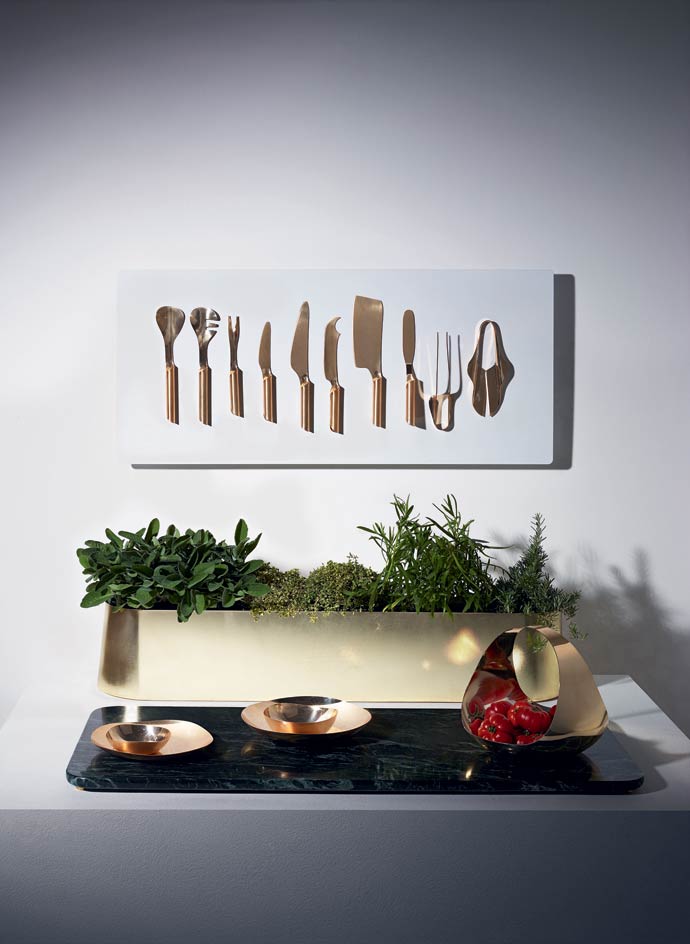 Final products include tweezers, scissors, knives, forks, spoons, plates, a marble cutting board, a steel trug