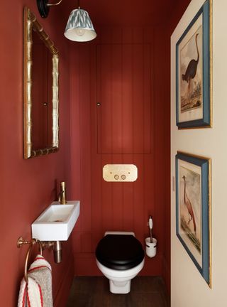 red cloakroom with paneled wall