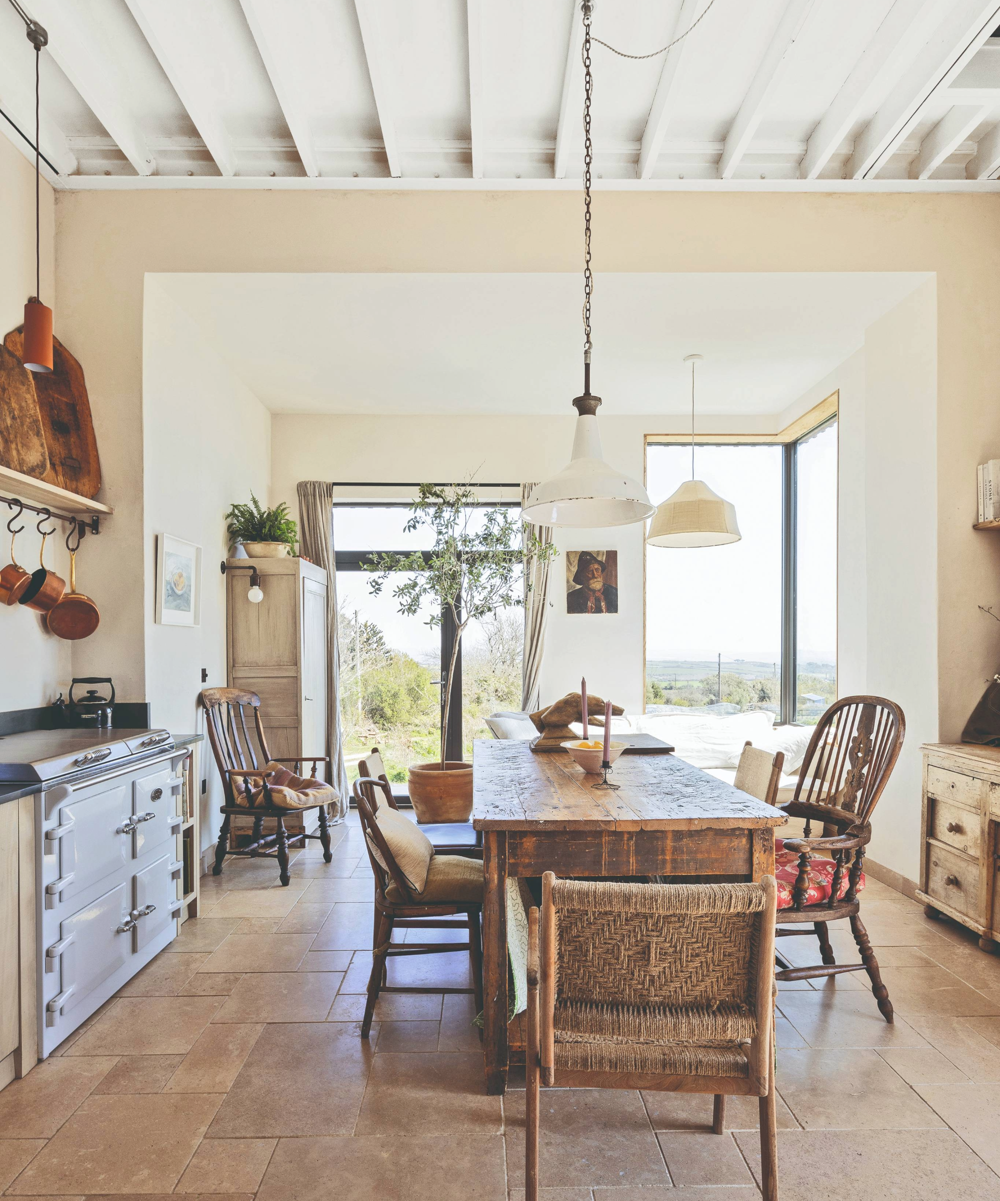 Kitchen diner with large windows overlooking countryside views