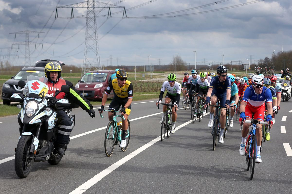 Riders are informed of their disqualification from the Scheldeprijs