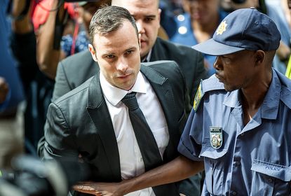 Oscar Pistorius pays less than $700 in bail and returns to house arrest until April