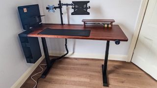 The pegboard, monitor arm and a modular shelf assembled on the EverDesk Max
