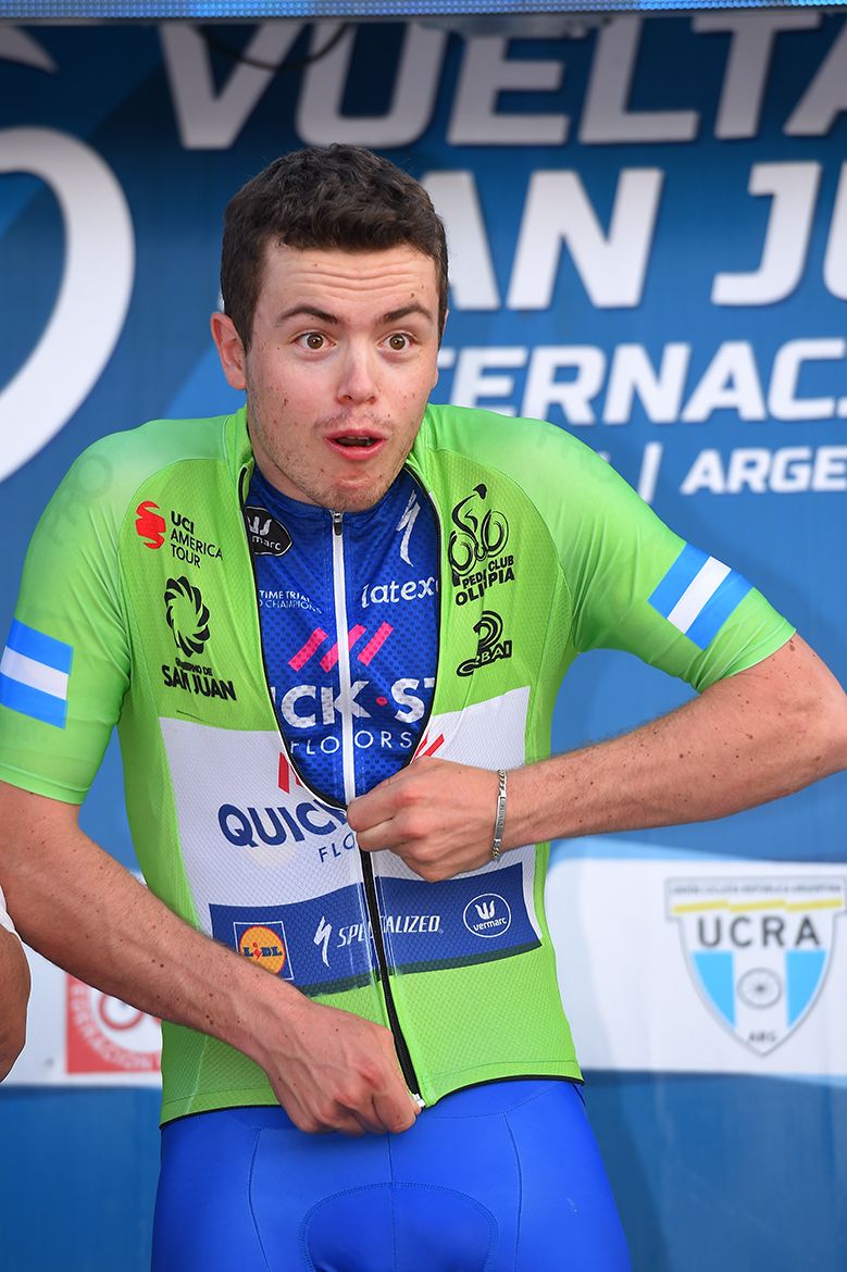 Remi Cavagna pulls on the jersey for best young rider