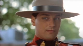 Paul Gross makes a face of surprise in uniform in Due South.