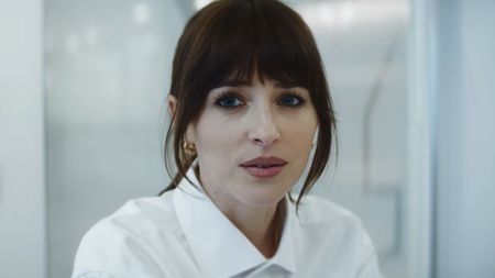 Dakota Johnson wearing white and bangs in the Verity trailer.