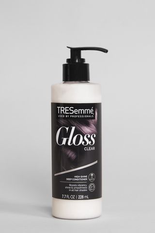 TRESemmé Color-Enhancing High-Shine Deep Hair Conditioner shot in Marie Claire's studio, one of the best hair glosses