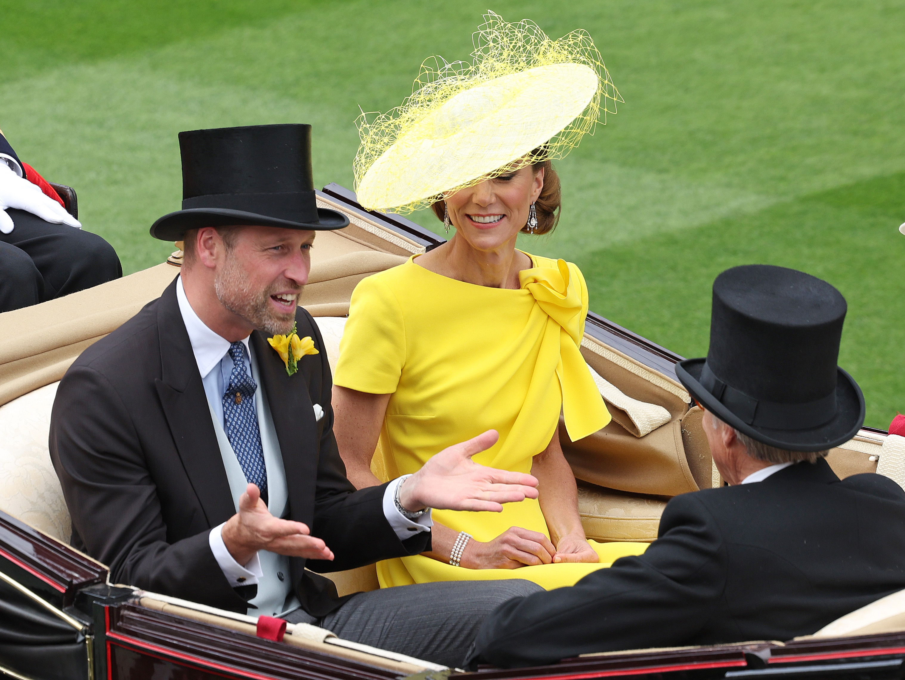 Princess Kate arriving at Royal Ascot 2026 Day 2 wearing a bright canary yellow dress and matching hat, while husband Prince William rides in the carriage in a top hat