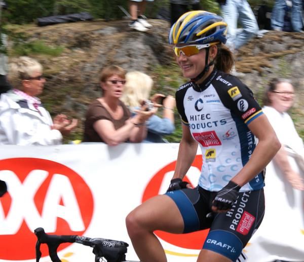 Emma Johansson with a big smile after passing the line