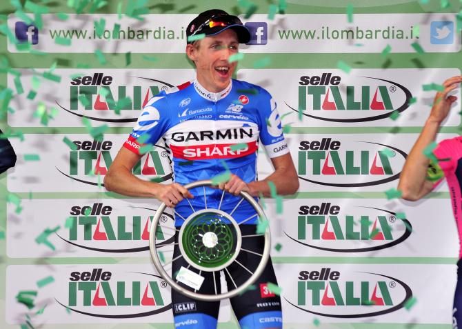Dan Martin looks delighted with his new trophy