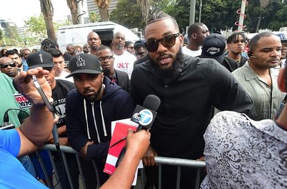 The Game is interviewed after a peaceful march to LAPD headquarters.