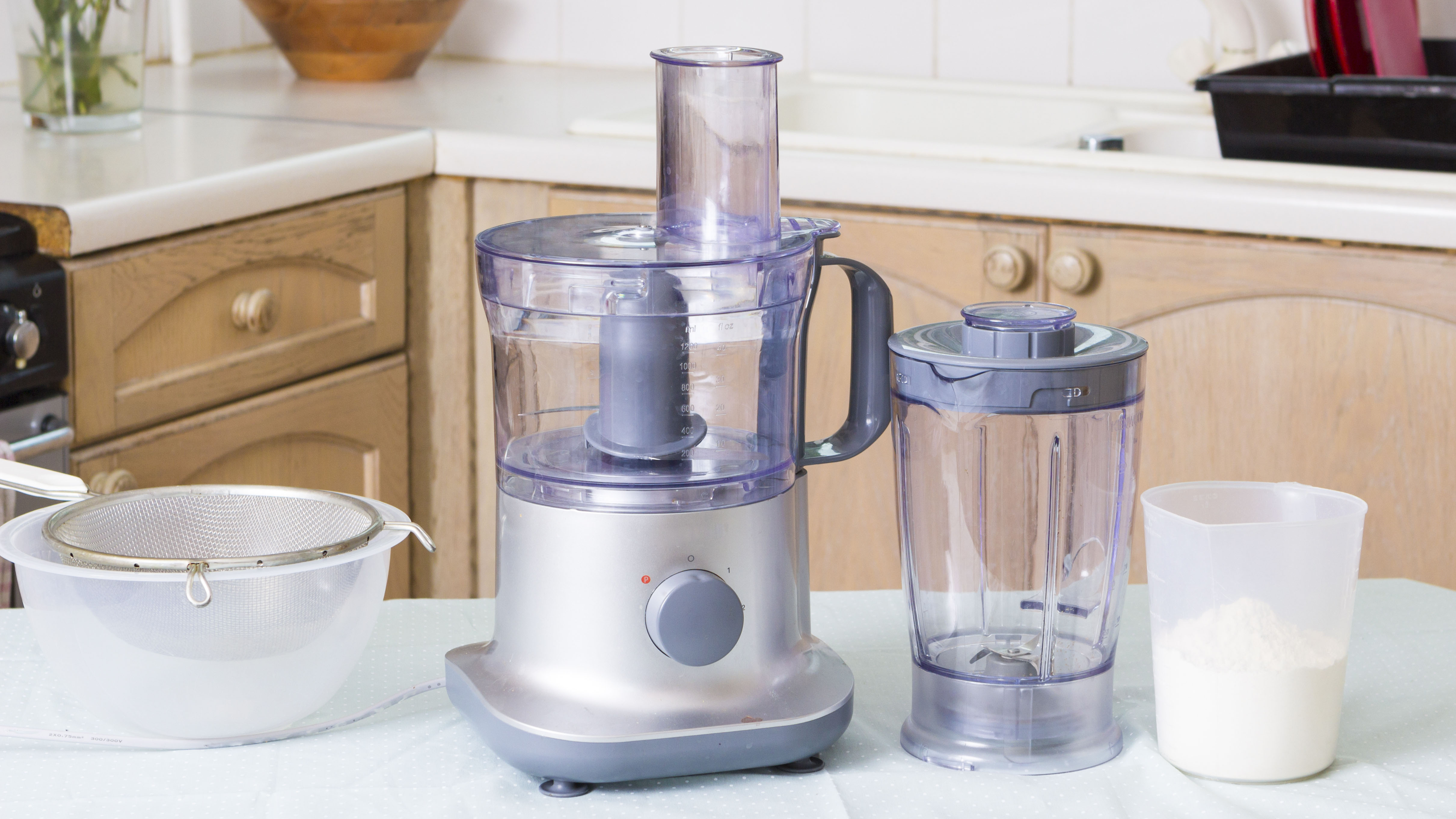 A food processor which also comes with a blending jug attachment
