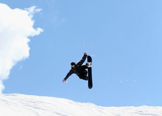 A snowboarder gets air at the Falls Creek Resort in Australia