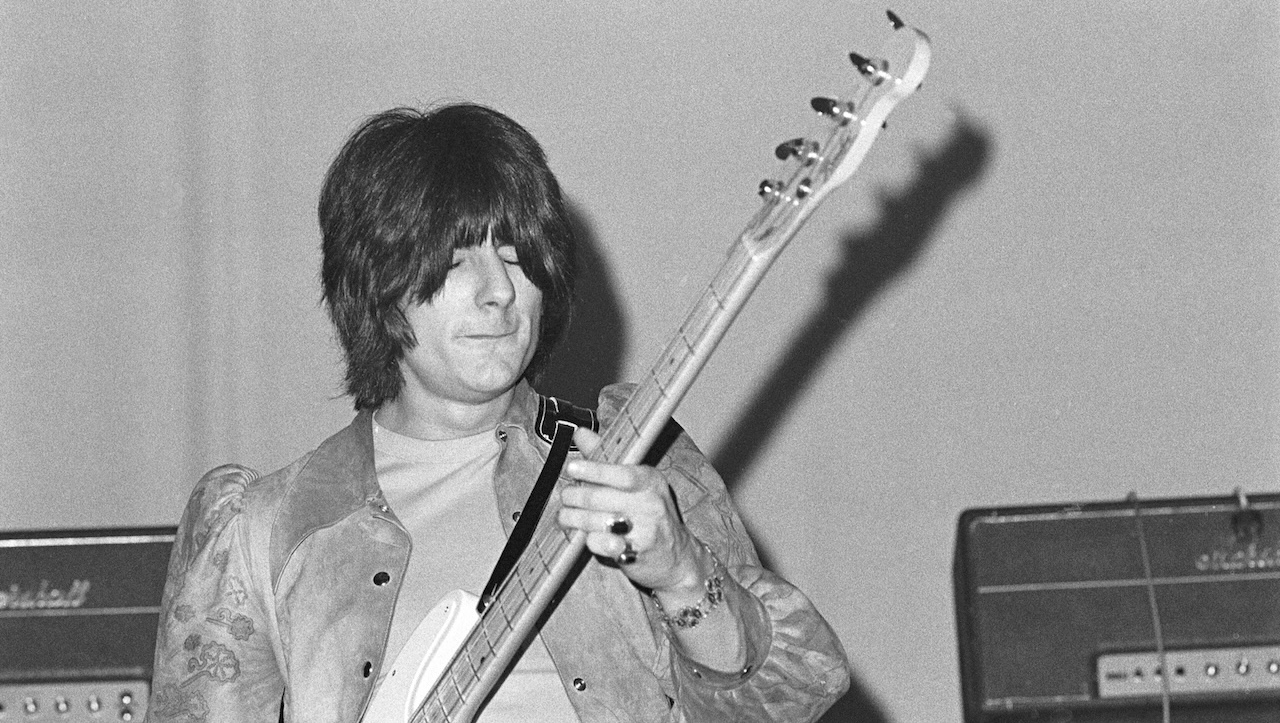 Ron Wood (Ronnie Wood) performing live onstage with the Jeff Beck Group, playing bass at the Shrine Auditorium
