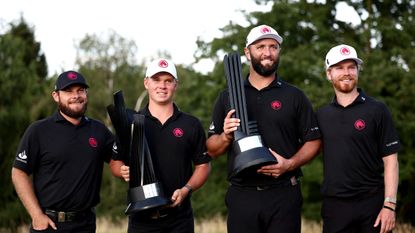 Legion XIII pose with the team trophy and Jon Rahm&#039;s individual title at LIV Golf UK