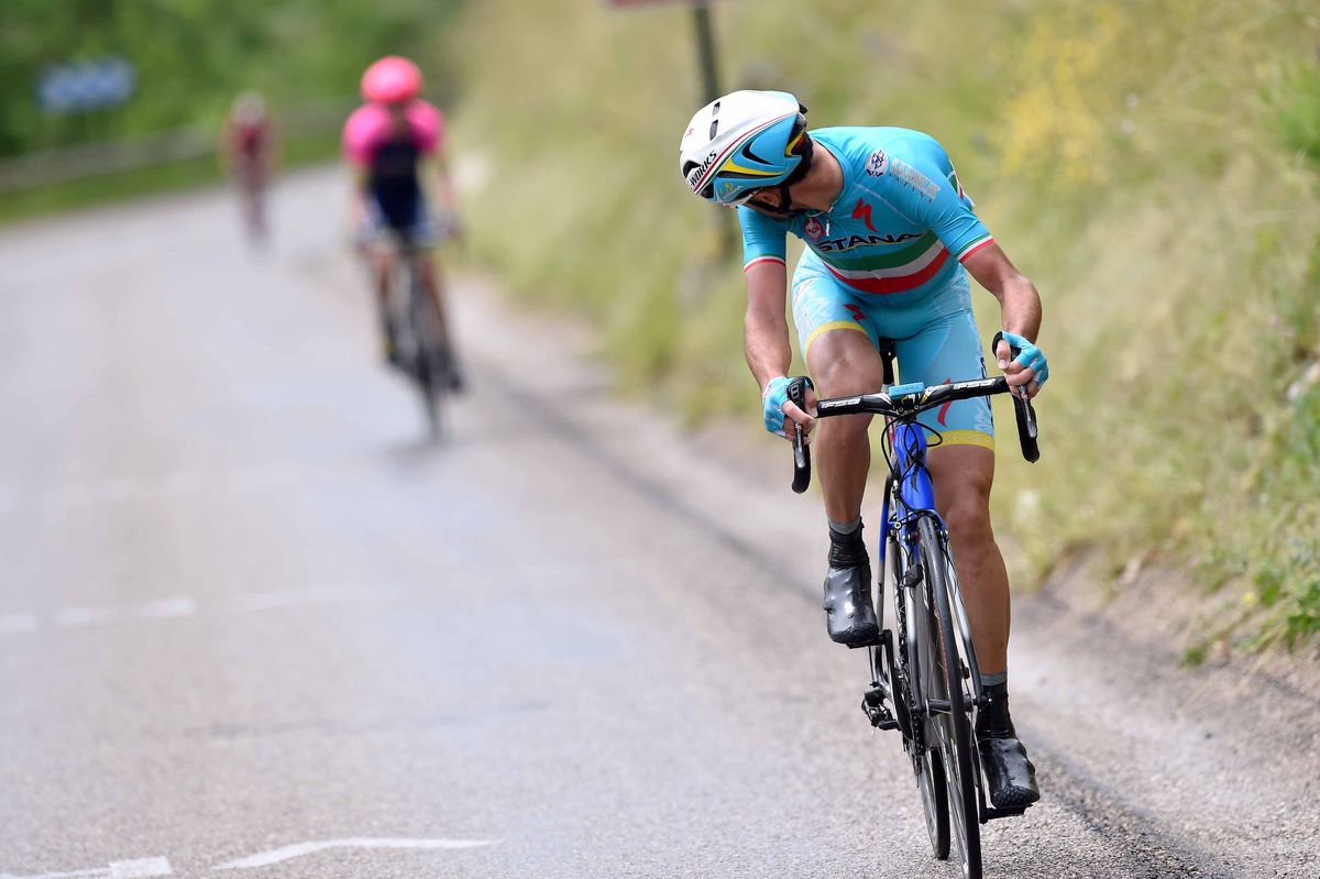 Vincenzo Nibali looks behind to see the damage he's done