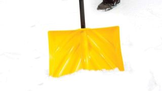 True Temper 18-Inch Pusher Poly Snow Shovel in use