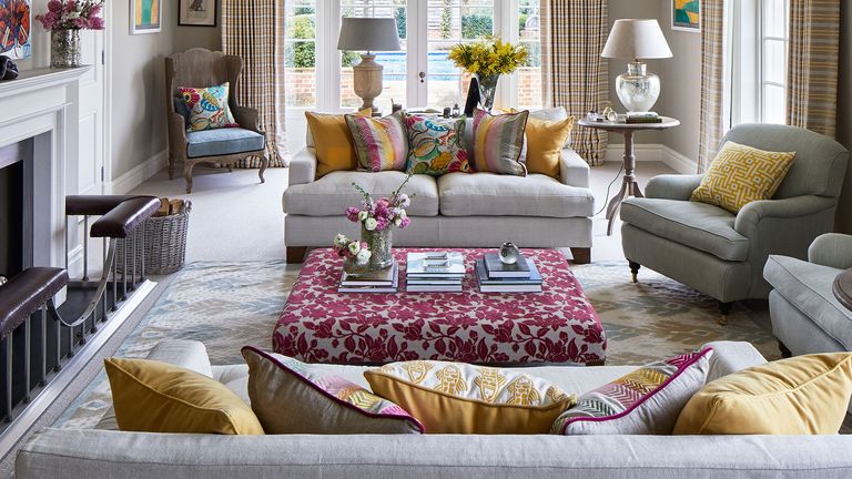 living room with carpet flooring and sofa set
