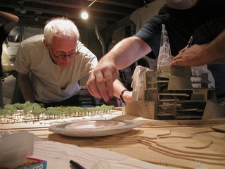 Antoine Predock working on a model of the Canadian Museum for Human Rights with his studio team