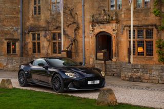 Aston Martin DBS 770 Ultimate in front of house