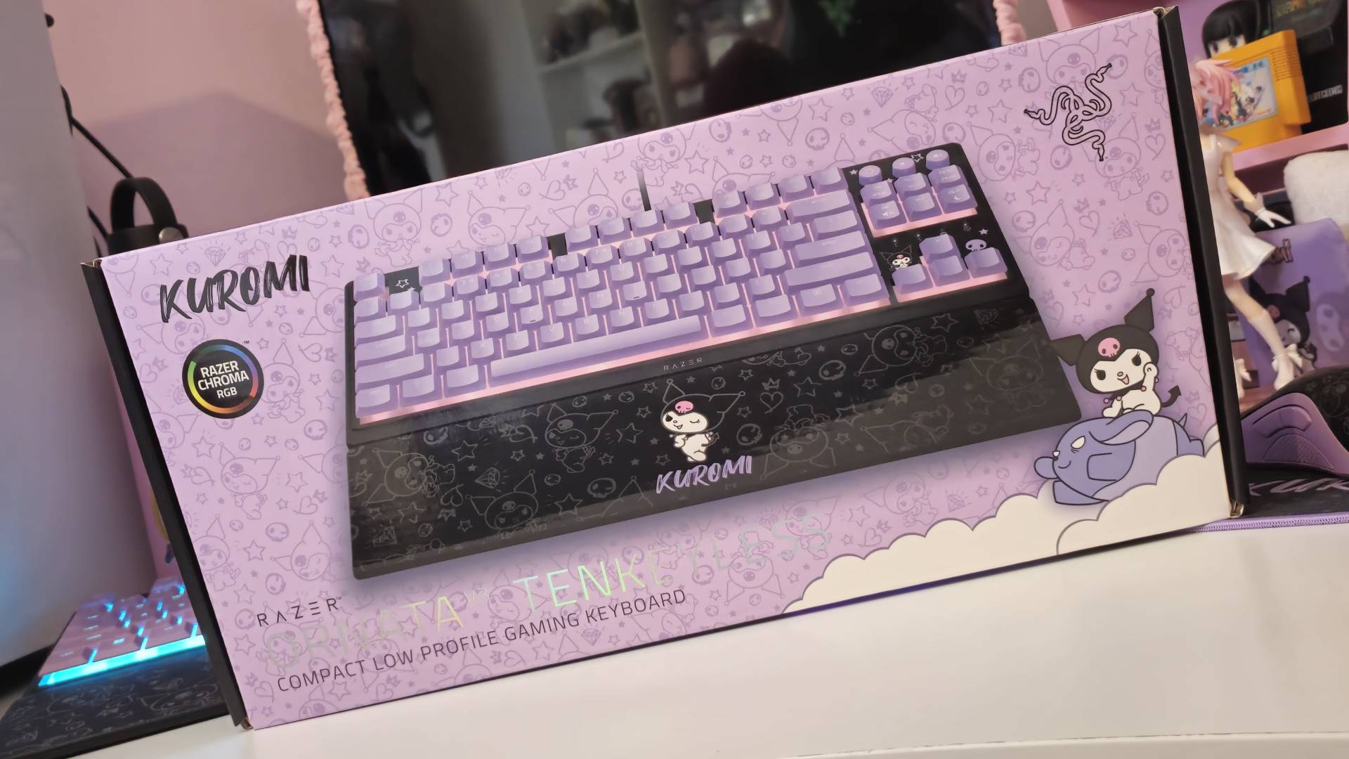 Photos taken by writer Rosalie Newcombe of the Razer Ornata V3 Tenkeyless Kuromi Edition gaming keyboard, on a white desk. 