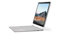 A Microsoft Surface Book 3, detaching it's display against a white background