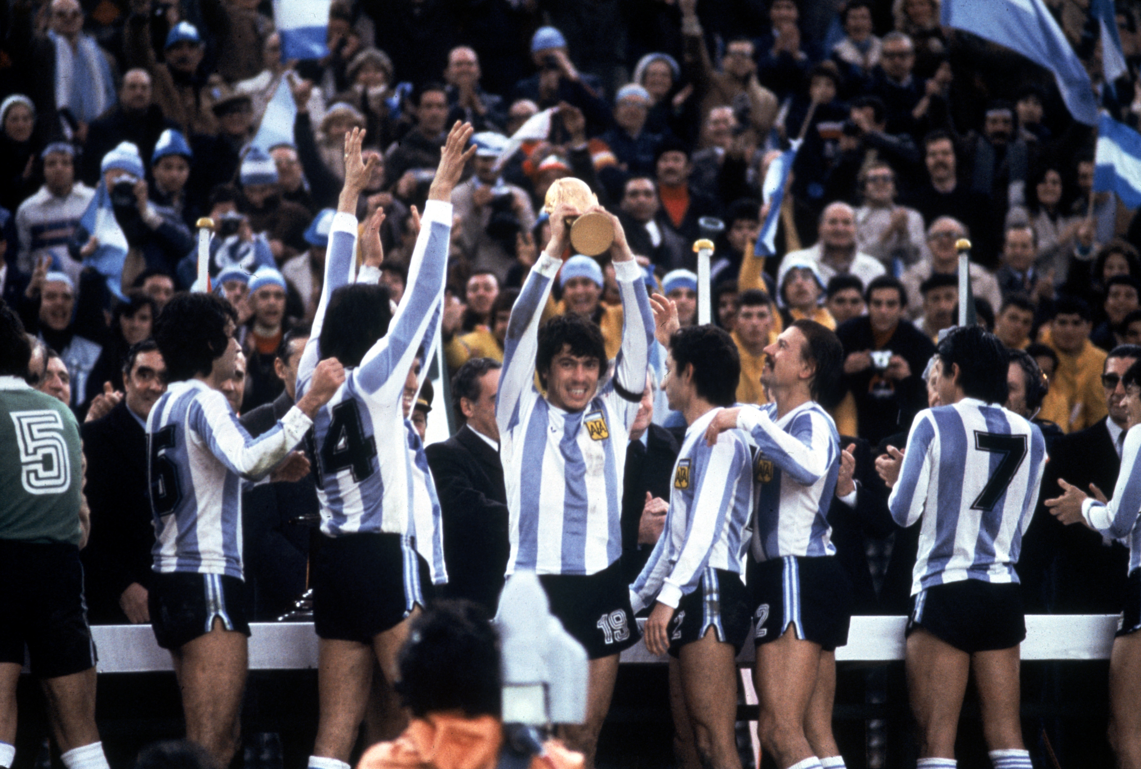 Argentina players celebrate with the World Cup trophy after victory in the final against the Netherlands in June 1978.