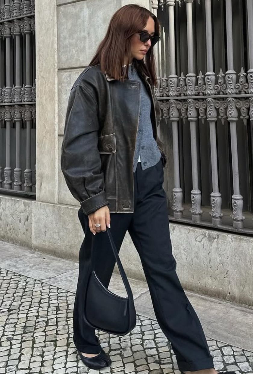 @deborabrosa wears a leather jacket