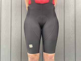 Female cyclist wearing the Sportful Women's Classic Bib Shorts
