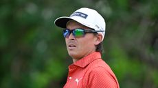 Rickie Fowler looks on through sunglasses during the first round of the 2025 Truist Championship
