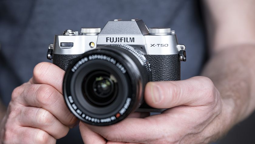 Fujifilm X-T50 camera in the hand