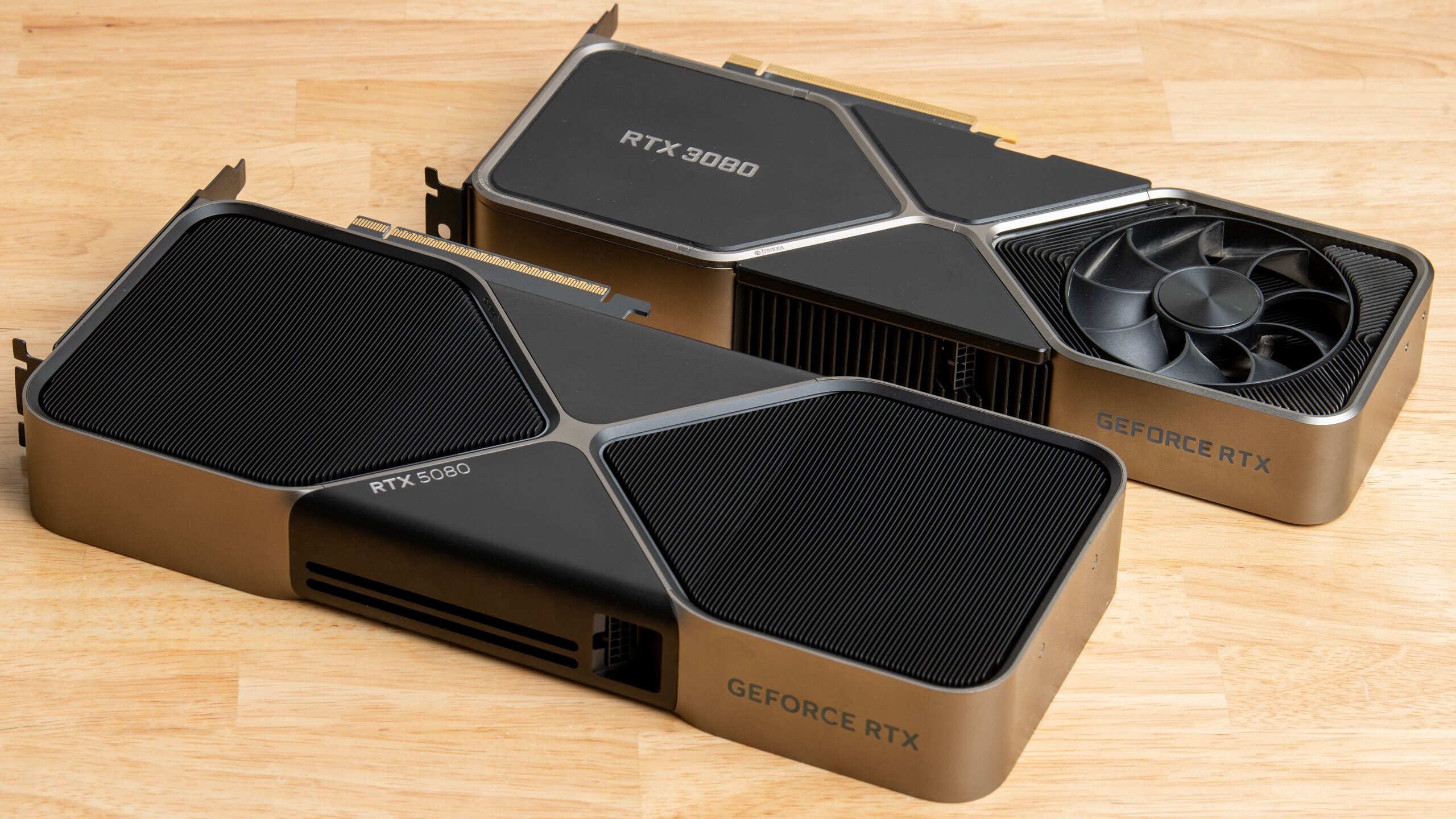 RTX 5080 and RTX 3080 Founder&amp;#039;s Edition on a desk.