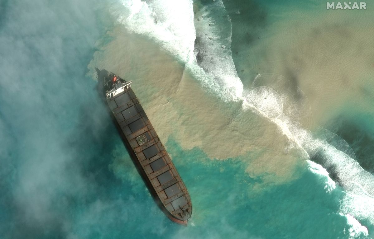 A bulk carrier ship, MV Wakashio, that recently ran aground off the southeast coast of Mauritius has been spilling oil into the sea, as seen in satellite images captured by Maxar Technologies on Aug. 7, 2020.