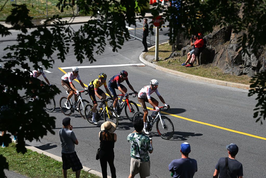MONTREAL QUEBEC SEPTEMBER 11 LR Michael Schar of Switzerland and Ag2R Citroen Team Christophe Laporte of France and Team Jumbo Visma Luke Rowe of United Kingdom and Team INEOS Grenadiers and Mickael Cherel of France and Ag2R Citroen Team lead the peloton during the 11th Grand Prix Cycliste de Montreal 2022 a 221km one day race from Montreal to Montreal GPCQM WorldTour on September 11 2022 in Montreal Quebec Photo by Dario BelingheriGetty Images