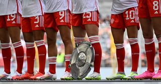 Bundesliga Season Preview: The Bundesliga trophy stands in front of players during the team presentation of the German first division Bundesliga club Bayern Munich in the stadium in Munich, southern Germany, on July 23, 2023.