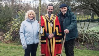 Alison Steadman and Larry Lamb stand with the Mayor of Billericay as they prepare to plant a tree in Alison & Larry: Billericay to Barry.