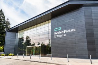 A view of a building with an HPE logo displayed on the outside
