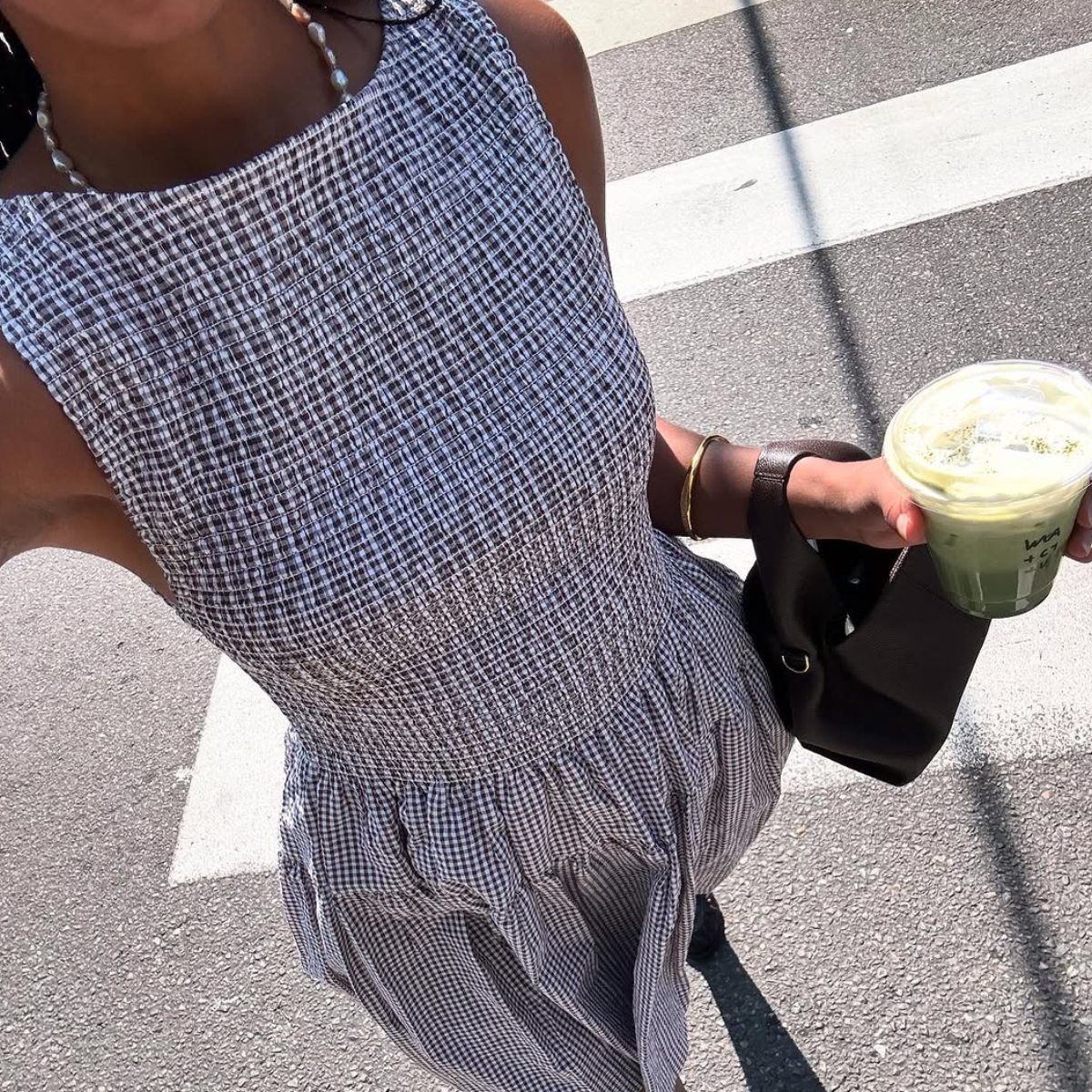 woman wearing gingham summer dress