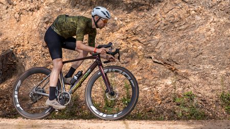 Thomas Wieckowski wearing one of the best gravel bike helmets and riding a gravel bike