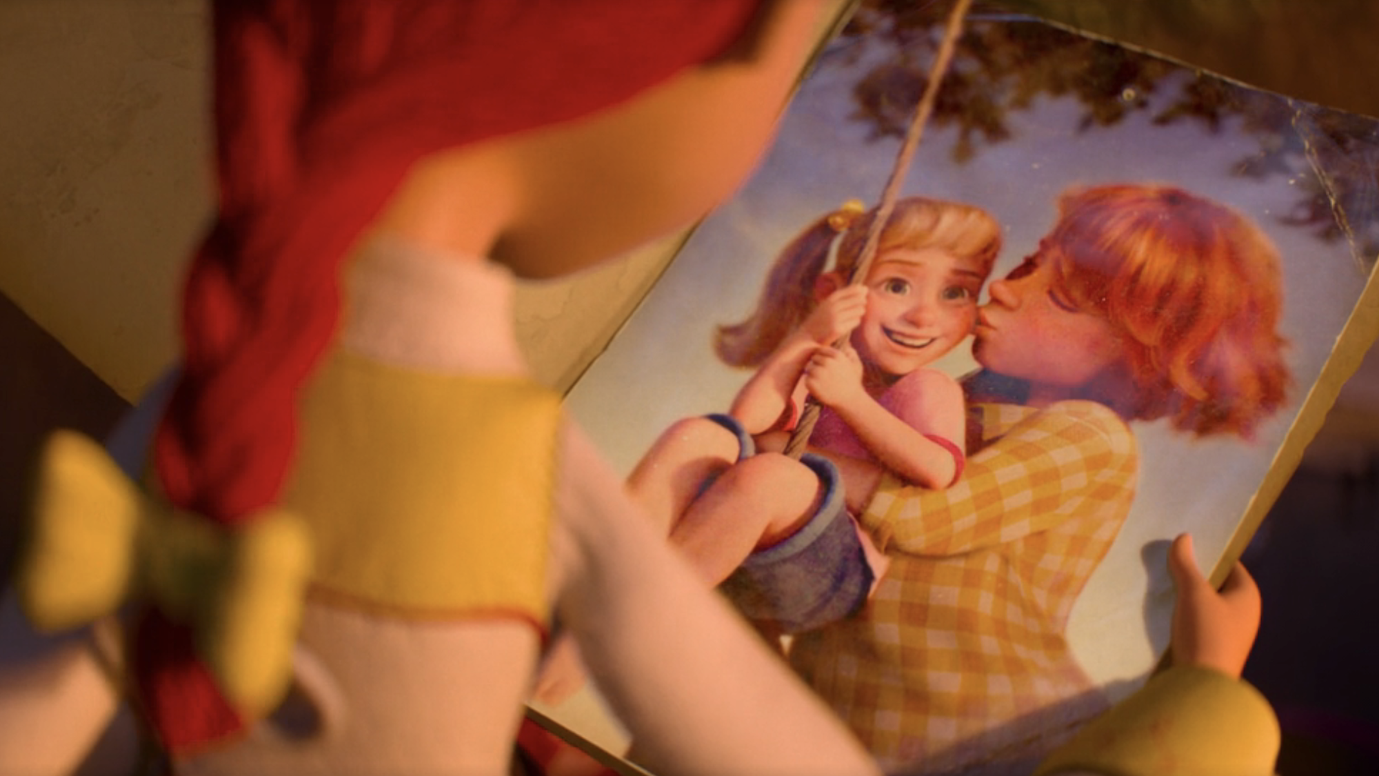 Jessie finding a picture of Emily and her daughter Jessie in Toy Story 5