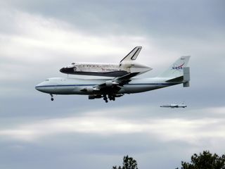 Shuttle Carrier Aircraft About to Land with Discovery