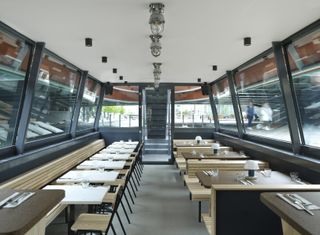 Cheese Barge restaurant opens on a canal in London, seen here with its main eating area