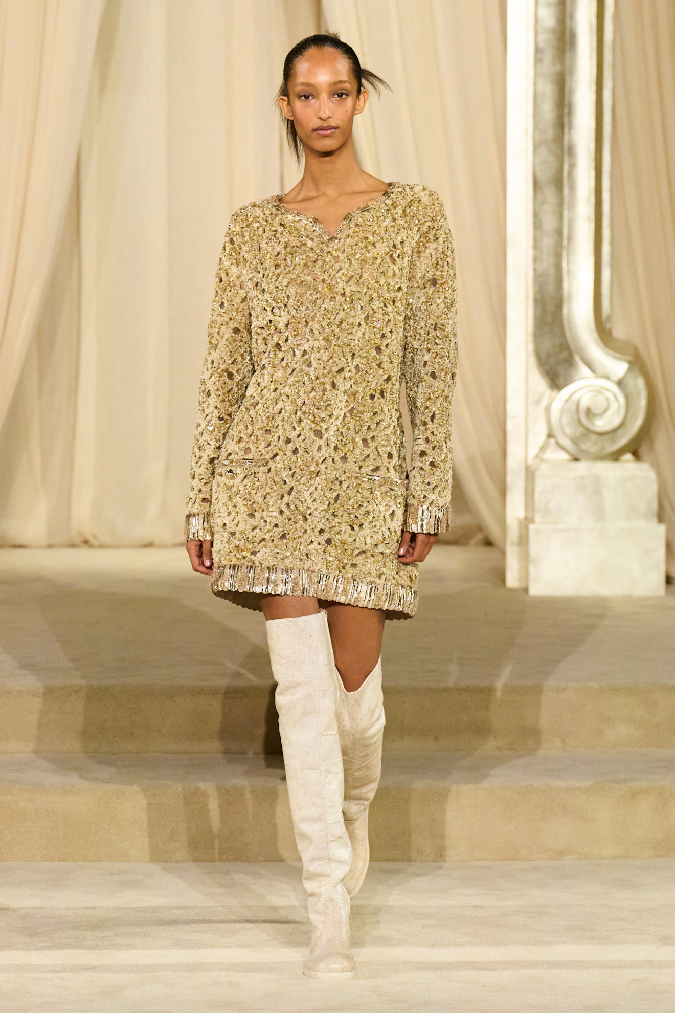 A gold look from Chanel's Couture autumn/winter 2025 collection
