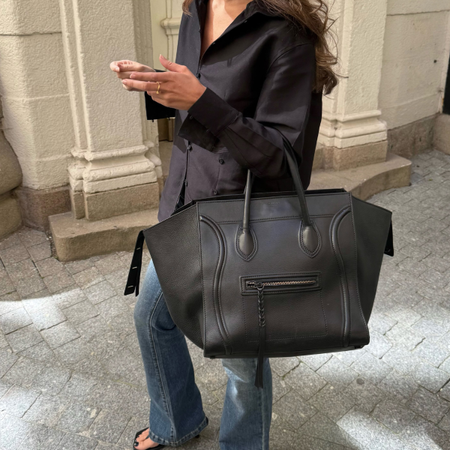 An image of a woman wearing low rise bootcut jeans trend 2026
