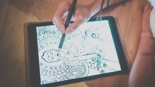 A photo of someone sharing how to draw on an iPad