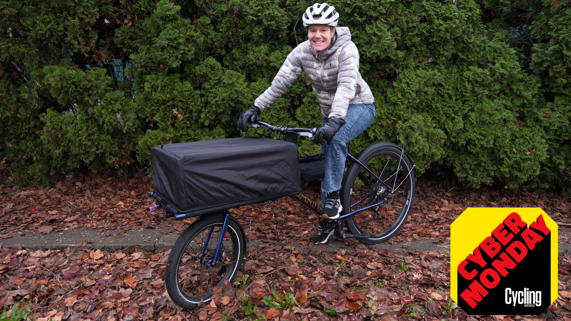 Anne-Marije Rook with her Omnium cargo bike, wearing Specialized&#039;s Packable Down Jacket