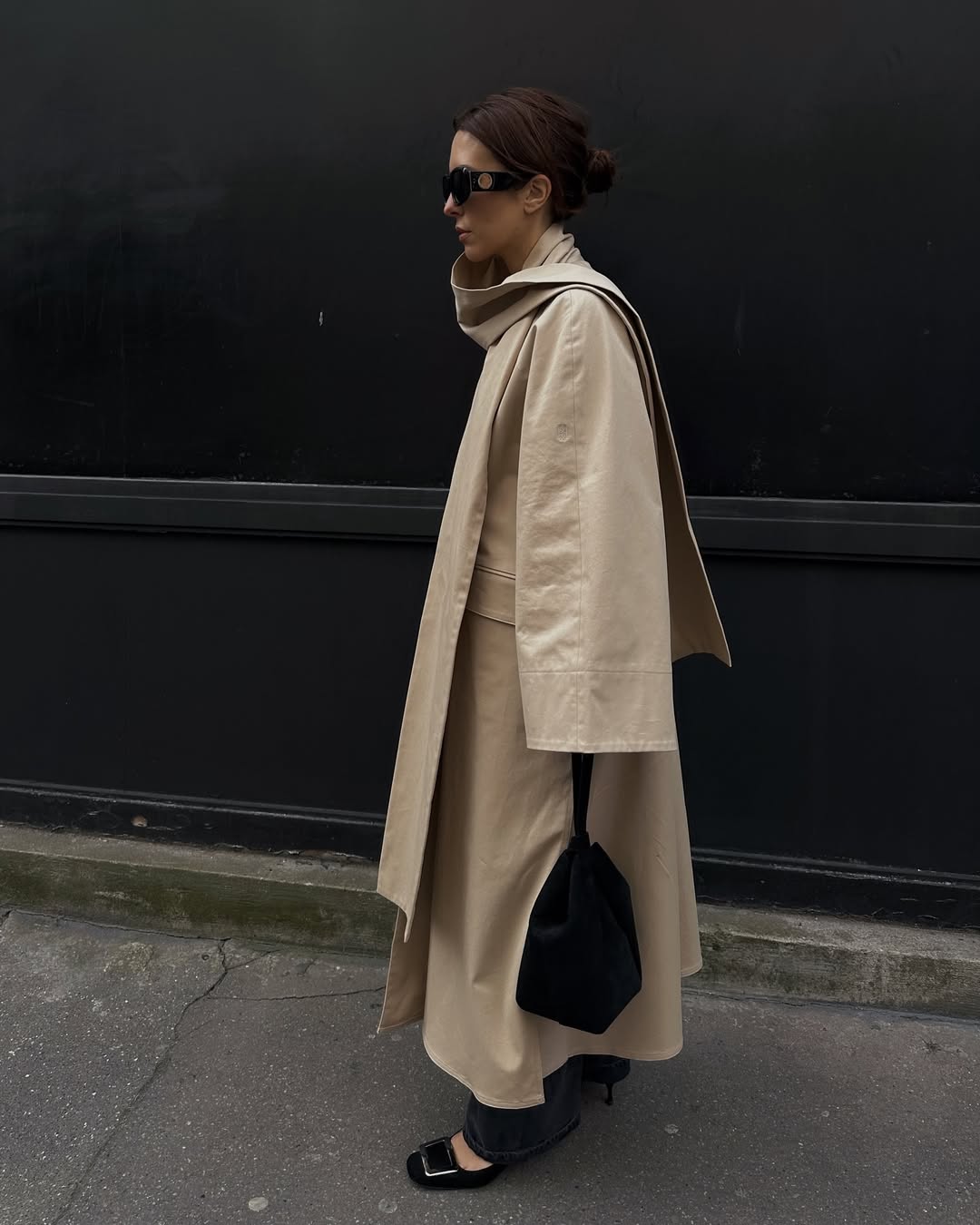 Debora in a scarf trench and black jeans